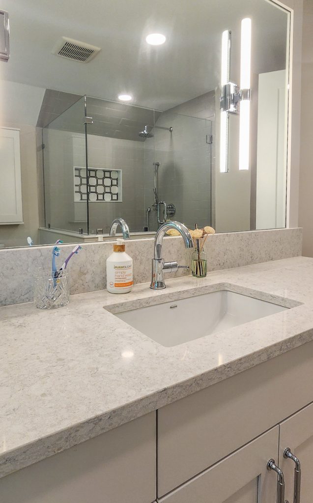 Timeless farmhouse - Elevated Designs: closeup of vanity sink and hardware