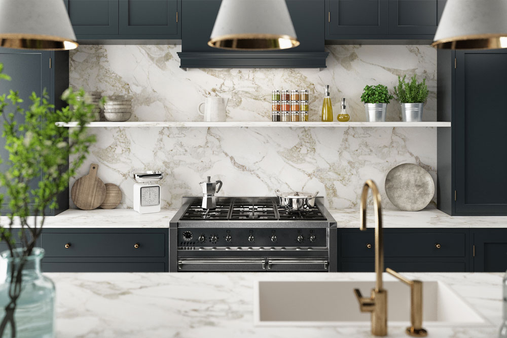 ElevatedDesigns_PersonalizedService black cabinets with white marble counters and gold accents.